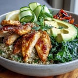 Paprika Roasted Vegetable Quinoa Bowl with fluffy quinoa, caramelized veggies, and zesty lemon salad.