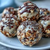 Energy balls with oats and chocolate chips, perfect for soccer game snacks, ready to grab and go.