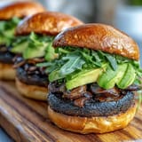 Hearty grilled portobello mushroom burgers, perfect for a delicious summer cookout spread.